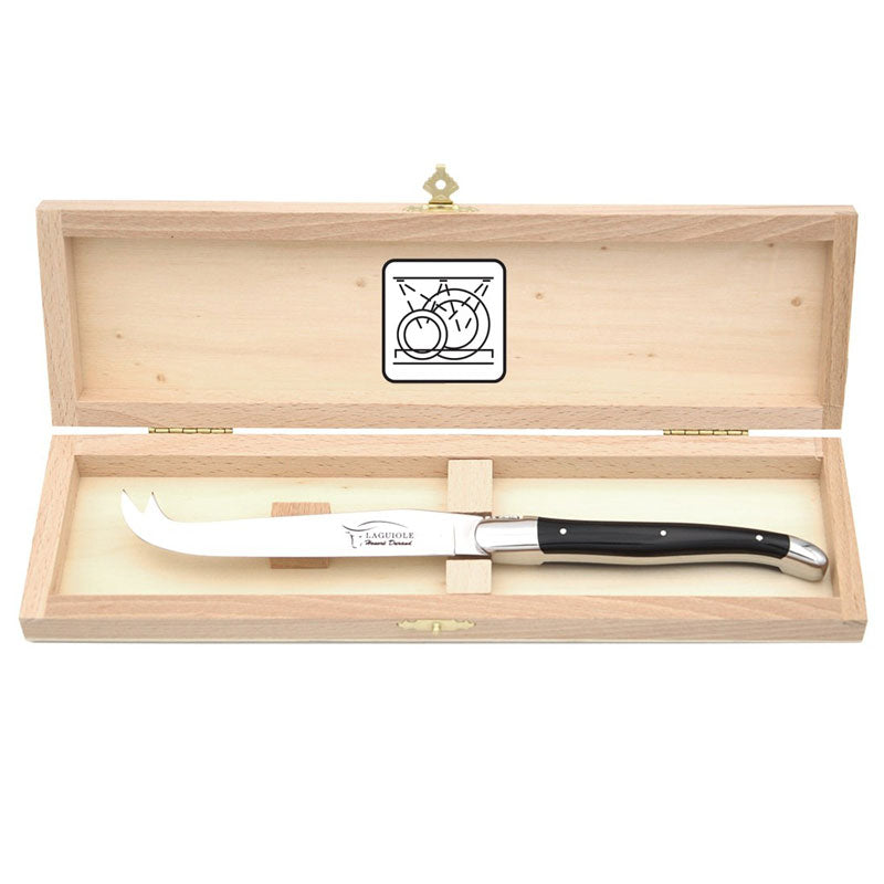 Laguiole steak knives. Slim white Corian handles with shiny